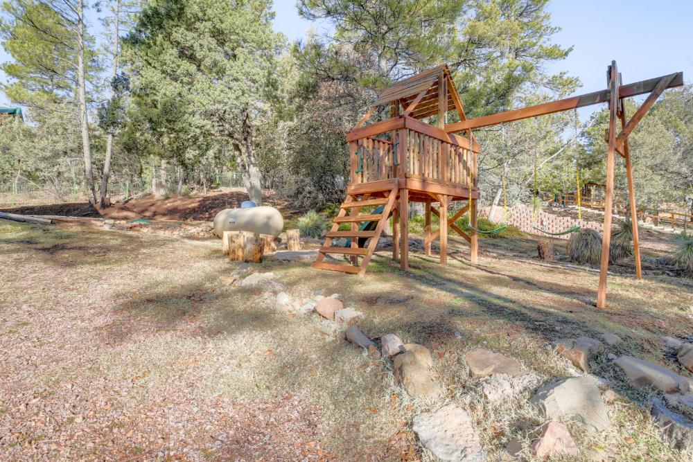 Mtn Views and Playground Family-Friendly Pine Cabin